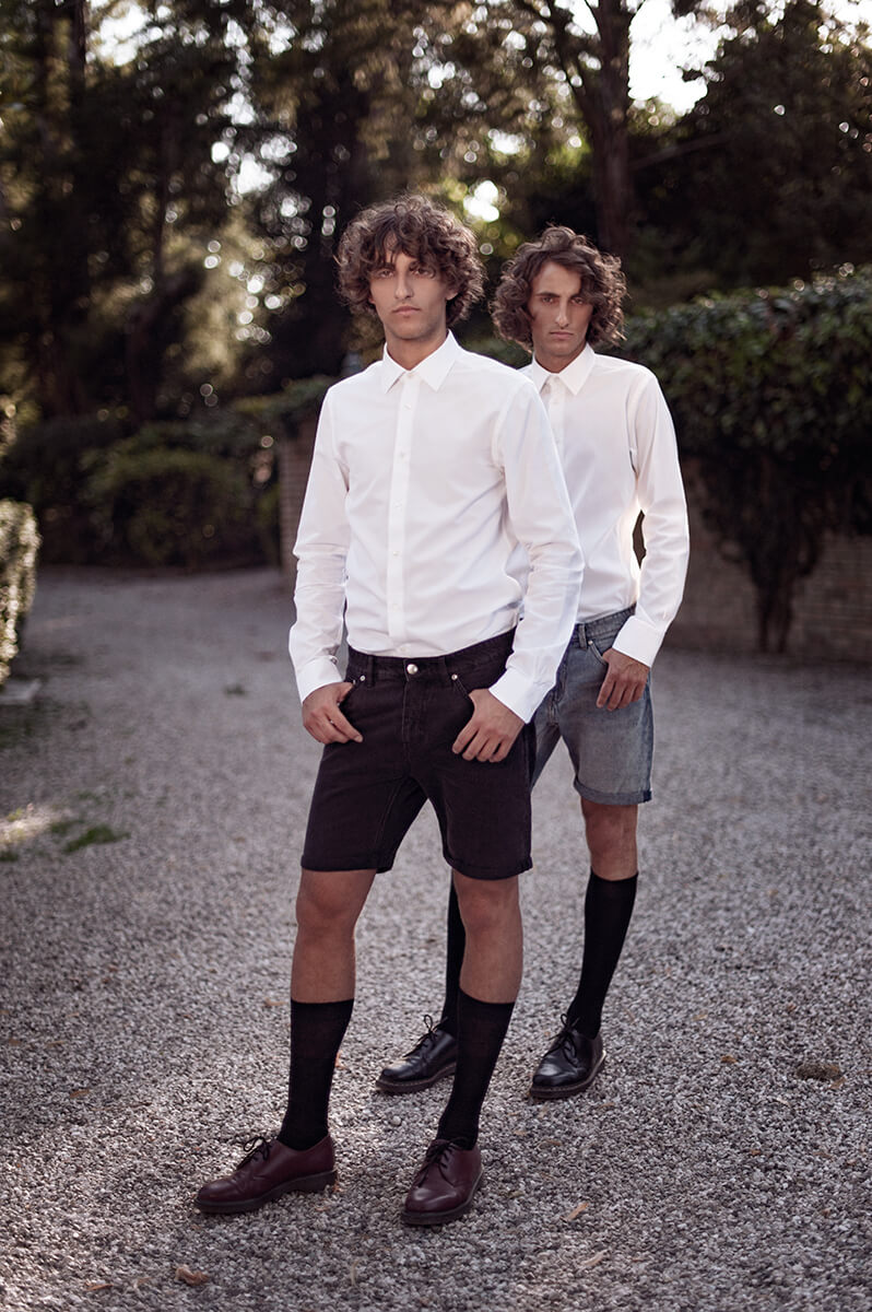 Venetian twin brothers with curly blond hair